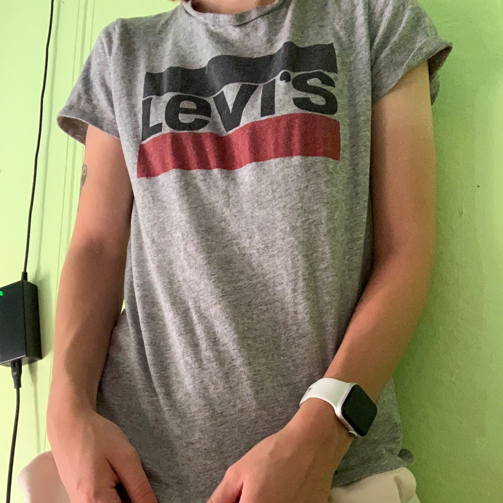 From Levi’s, small in woman’s, grey t shirt
